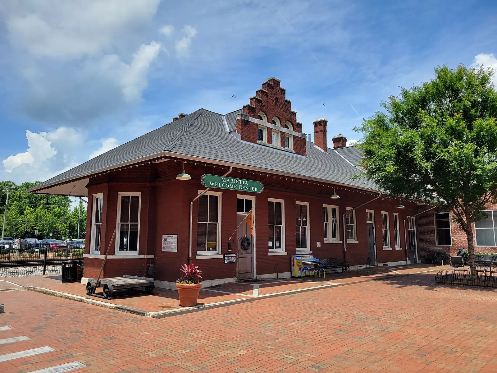 The historic Marietta Depot, now the Marietta Welcome Center, beside the railroad downtown