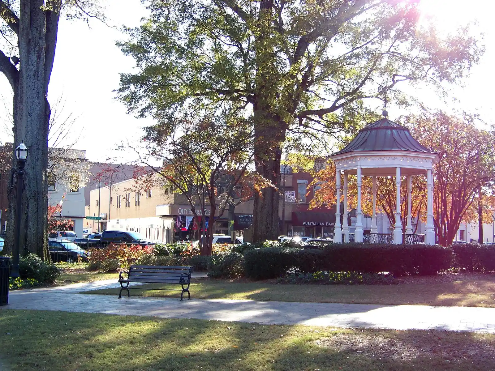 The gazebo in Glover Park on Marietta Square, with storefronts across the street