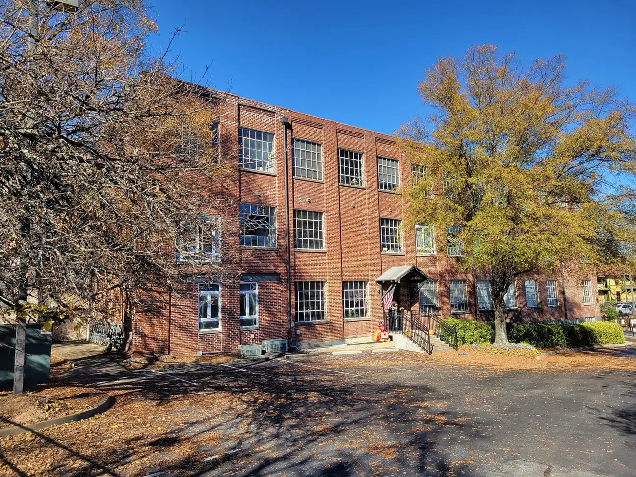 The Brumby Lofts building in Marietta, with fall color in the trees