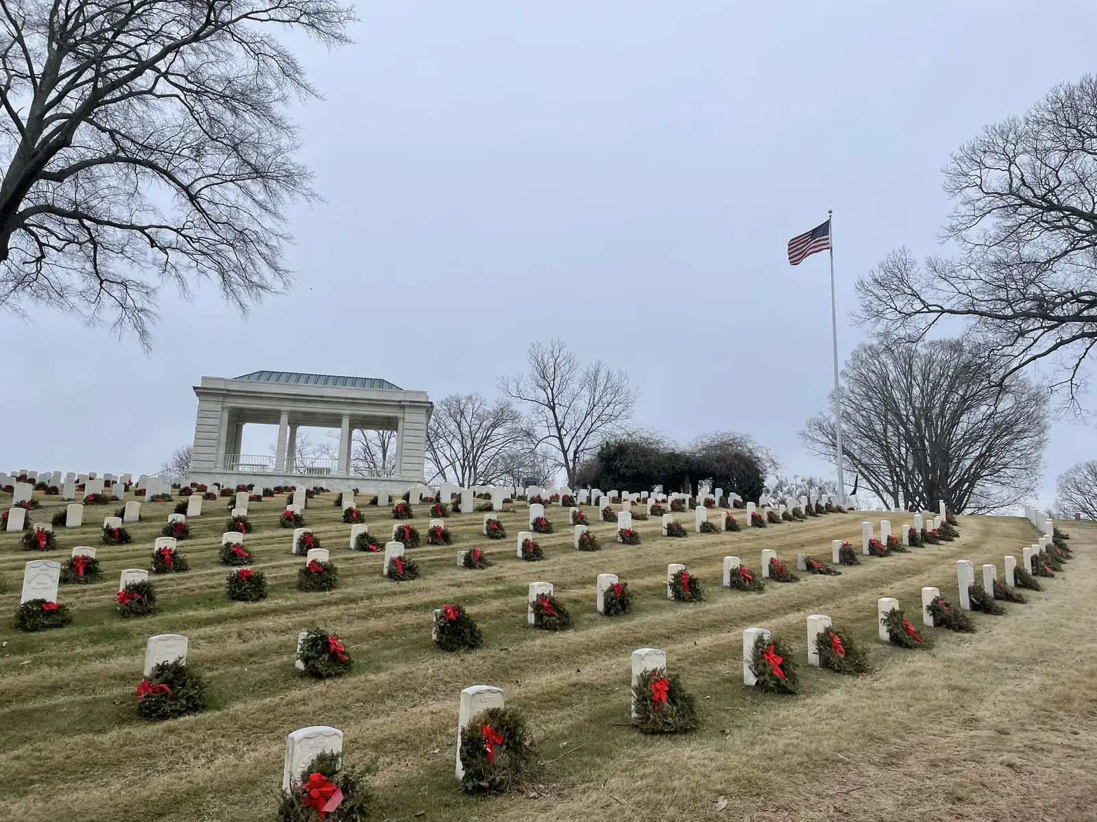 Headstones with holiday wreaths at Marietta National Cemetery, 500 Washington Ave.