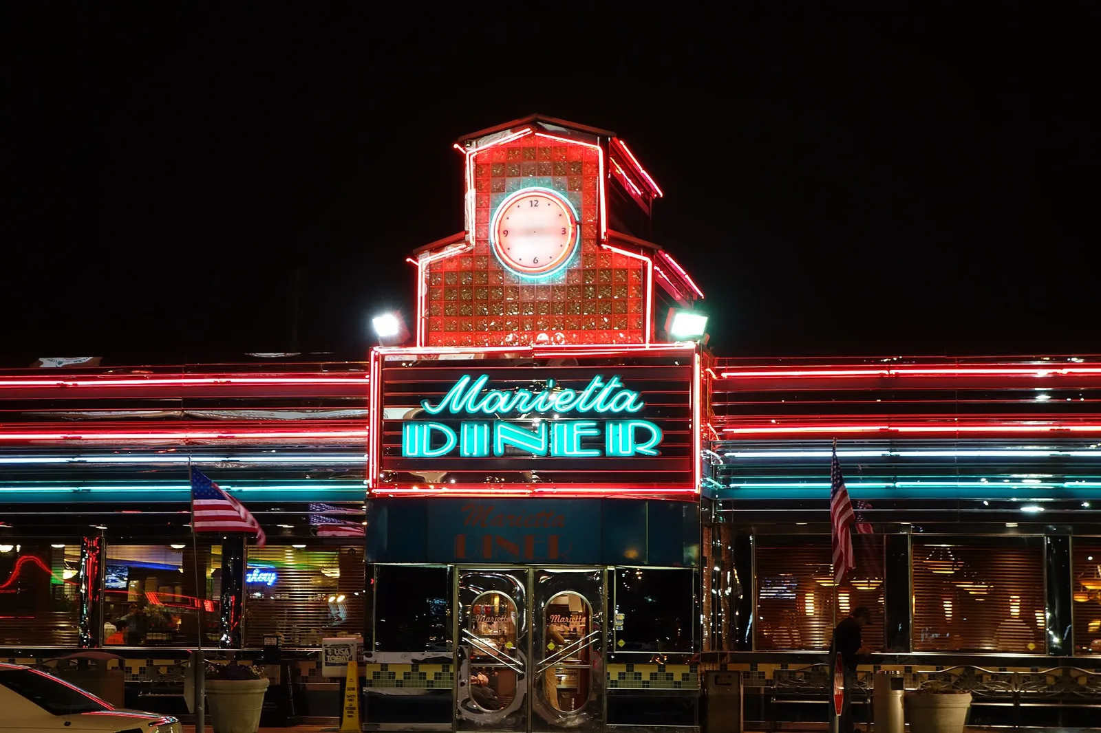 The neon front of the Marietta Diner at night
